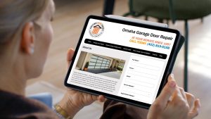 - Tablet screen showing garage door repair service provider’s About Us page