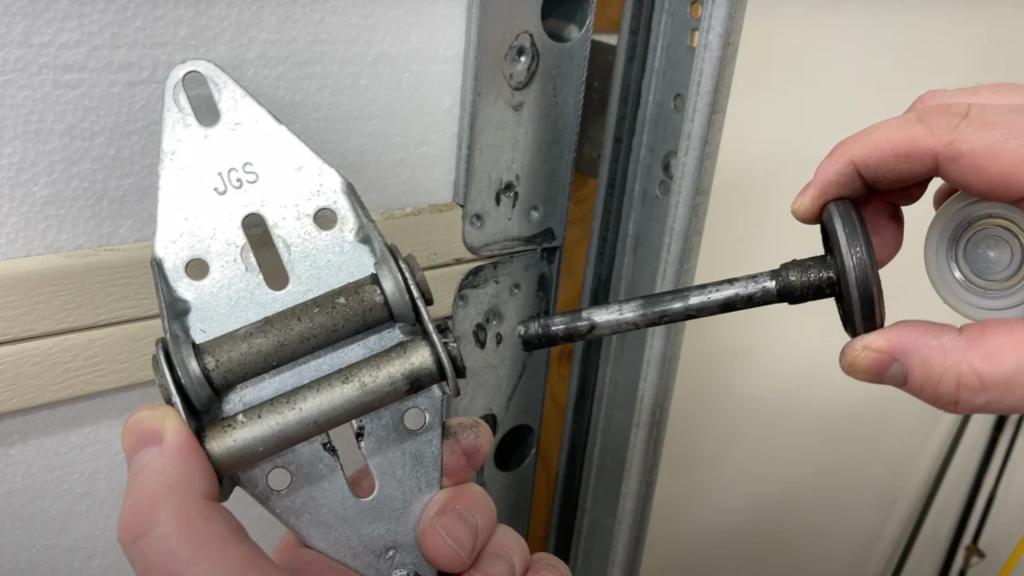 Garage door won’t close issue caused by damaged roller hardware