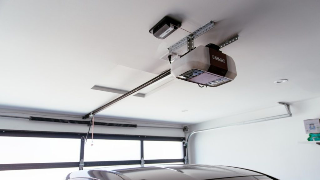 A garage door equipped with an opener with backup battery