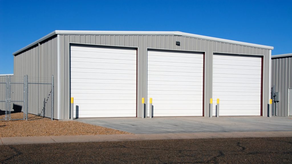 Industrial garage doors in white paint