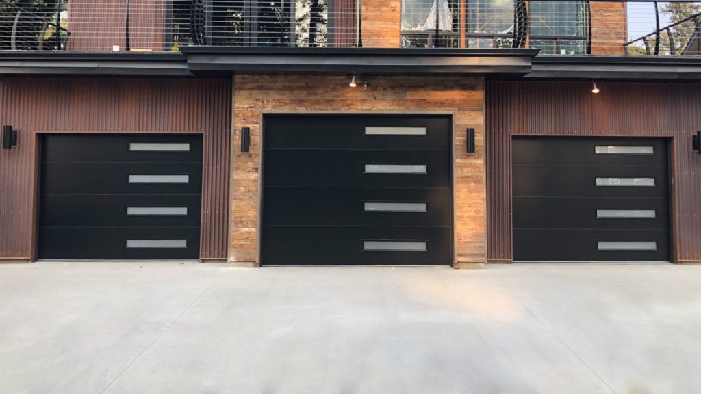 Doors with steel garage door panels