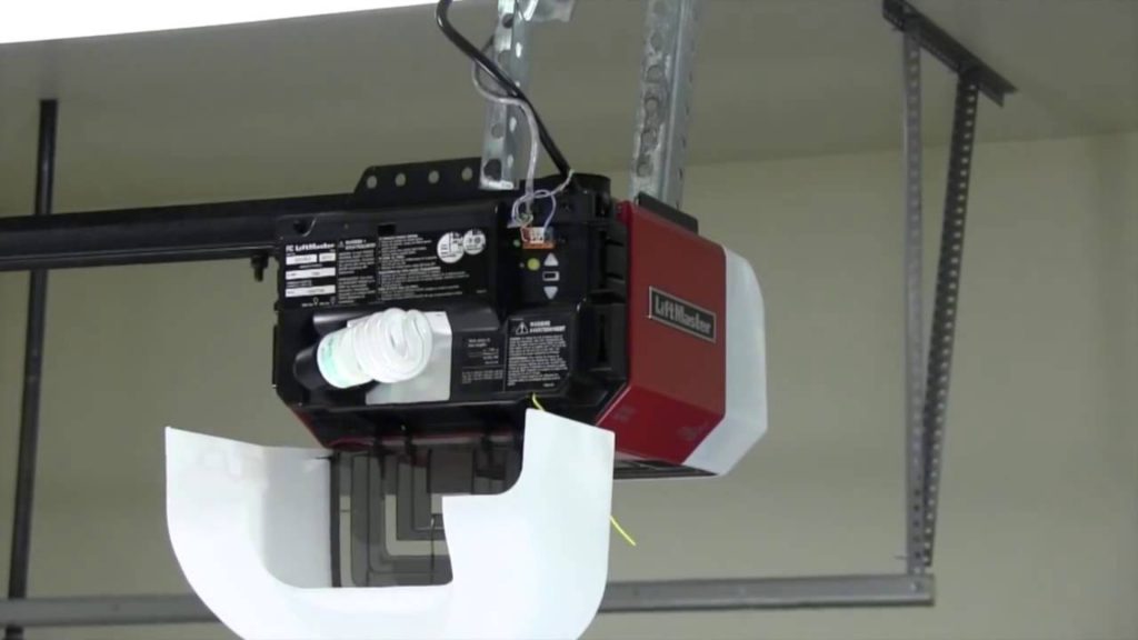 A LiftMaster unit with garage door battery backup with open housing for inspection