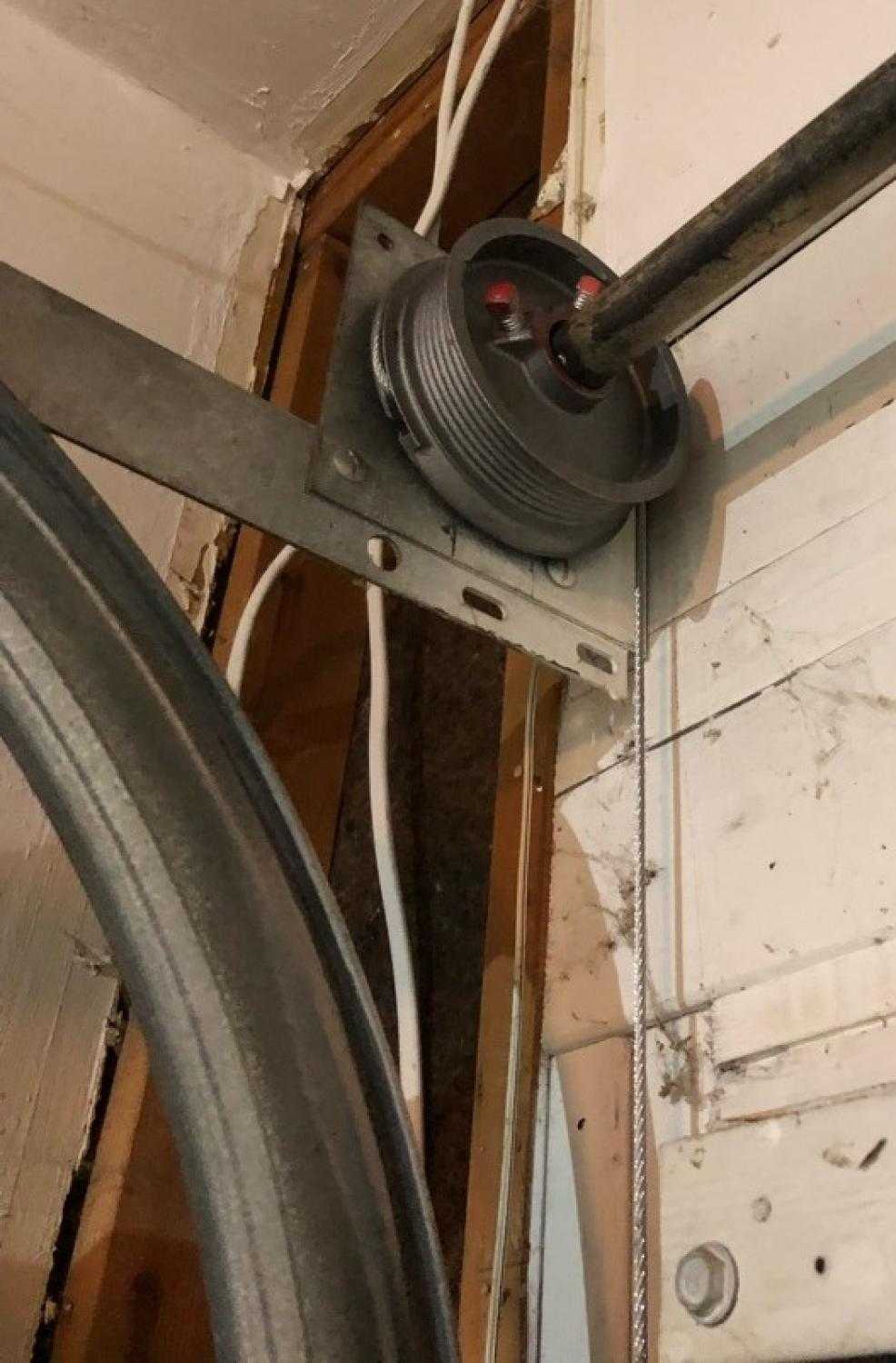Broken Garage Door Cable Repair Carolina Dr, Carter Lake