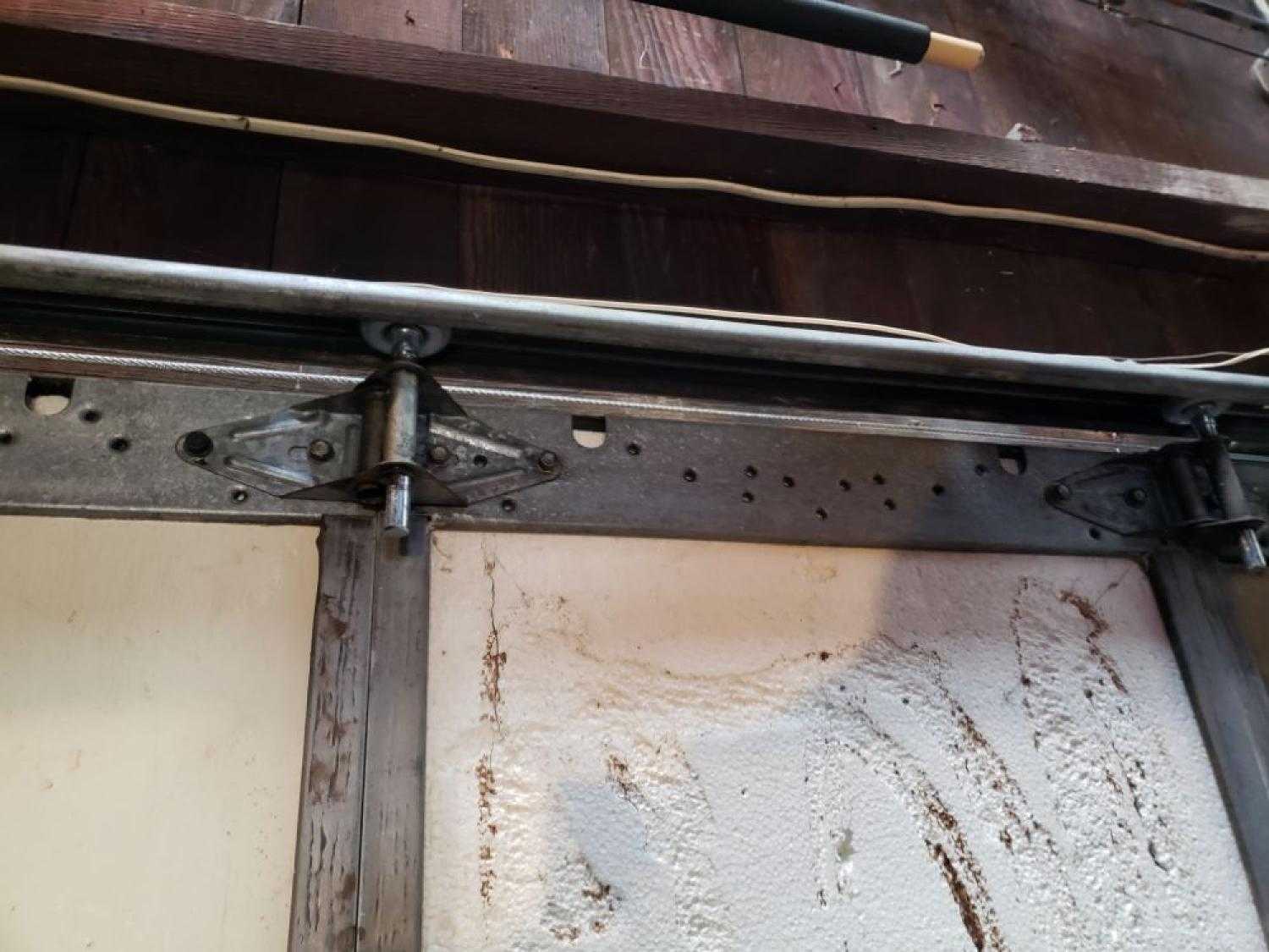 residential garage door repair garage door maintenance near me garage door service garage door service near me garage door tune up Garage Door Roller Repair Stony Brook Blvd, Omaha, NE